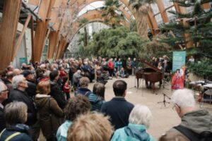 Sheffield people watching a free Classical Sheffield festival performance in the Winter Gardens